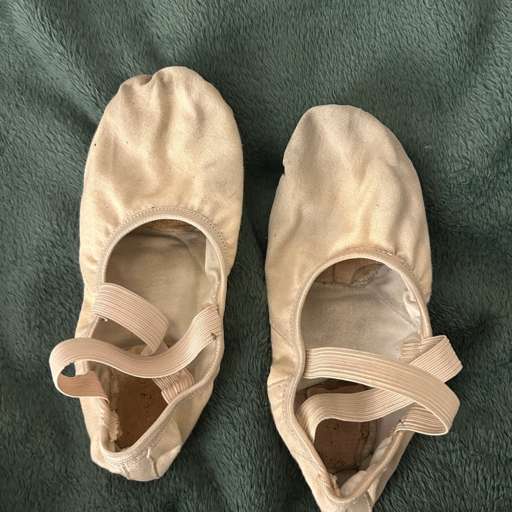 well worn ballet flats